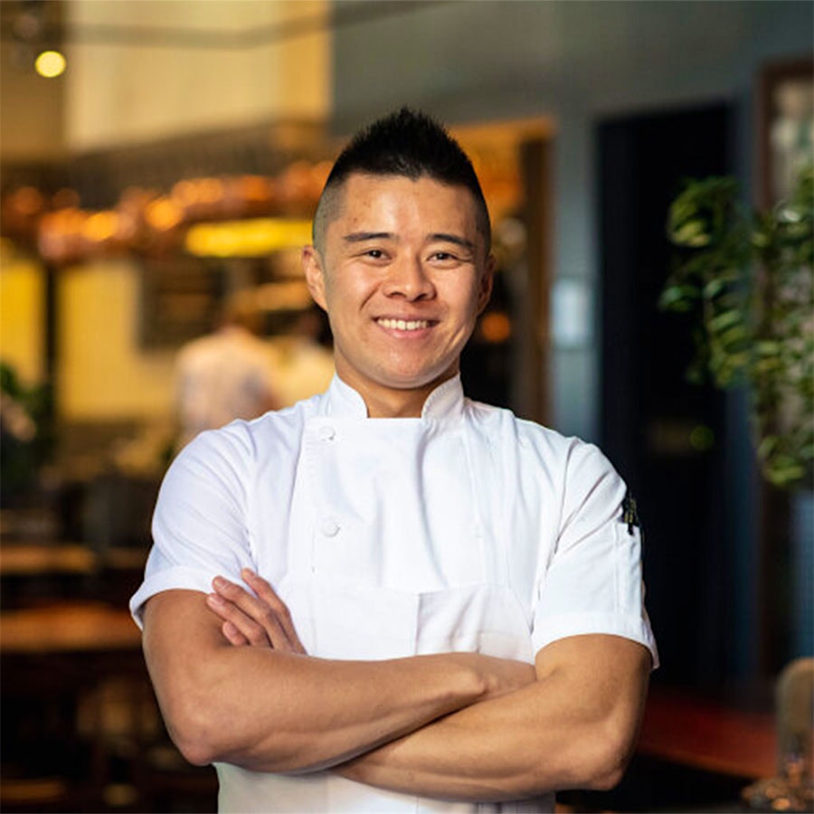 Portrait of chef Richard Lee with arms folded